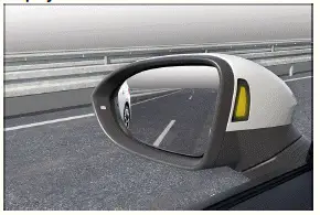 Volkswagen ID.3. Fig. 1 In the housing of the outside mirrors: Side Assist indicators