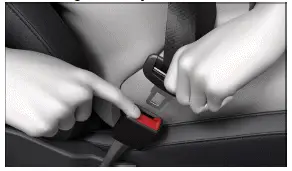 Volkswagen ID.3. Fig. 2 Releasing the buckle tongue from the safety belt buckle (general example).