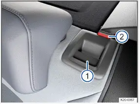 Volkswagen ID.3. Fig. 1 In the rear seat backrest: release button.