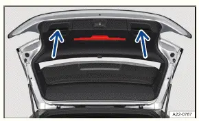 Volkswagen ID.3. Fig. 1 Opened trunk lid: Recessed grips for pulling the lid shut.
